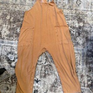 Free People Movement Hot Shot Onsie size small in tan
